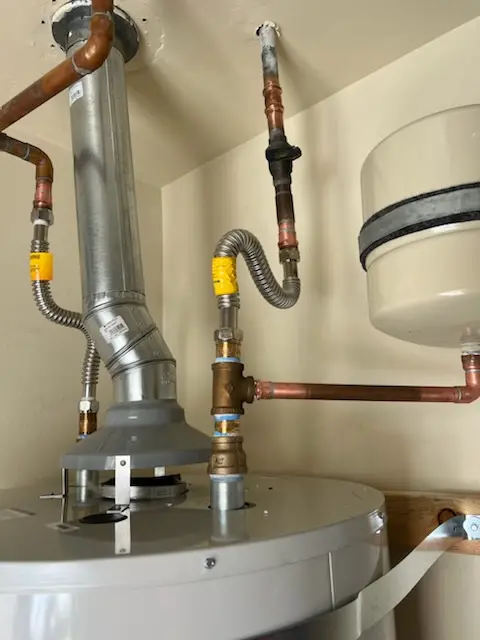 Water heater installation and plumbing repair in The Meadows